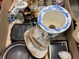 a box full of assorted items sitting on the floor