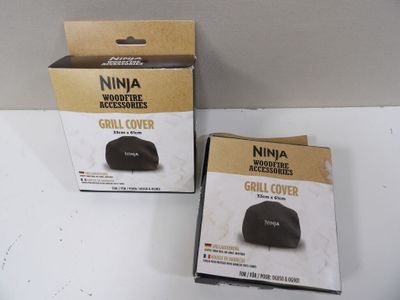 Deux boîtes d'accessoires Nina sont posées sur une surface blanche.