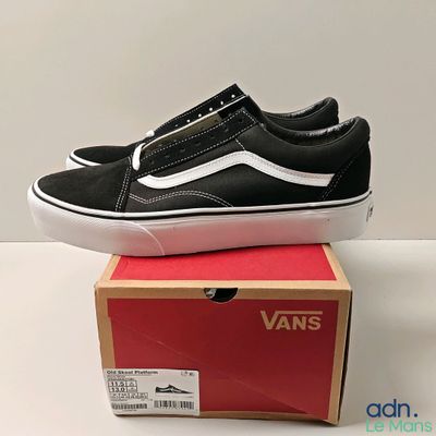 vans old skooler slip on sneakers in black and white