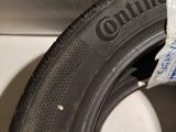 a close up of a tire with a sticker on the side of it