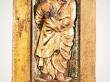 an image of a statue of a man holding a baby