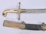 three different types of swords are displayed on a white surface