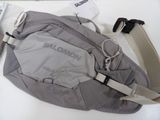 a bag that is sitting on a table next to a cell phone