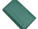 an image of a green leather wallet on a white background