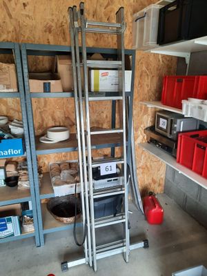 a ladder that is leaning against a wall in a garage