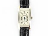 a close up of a wrist watch with roman numerals on it