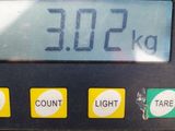 a close up of a digital scale on a table