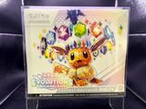 pokemon trading card with pikachu and other items on display