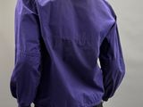 an image of a mannequin mannequin wearing a purple jacket and black skirt