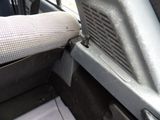 a close up of a car door handle with a cloth on it