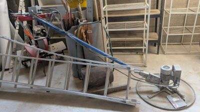 an image of a pile of tools in a garage