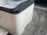 a printer that is sitting on top of a table