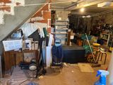 an image of a messy room with a lot of clutter