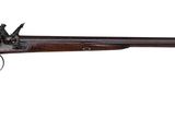 a rifle with a wooden barrel on a white background