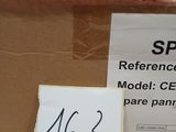 a cardboard box with a train on it and a sign on it