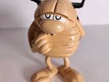 a toy figure of a man with a hockey stick in his hand