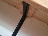 a close up of a piece of wood on a shelf
