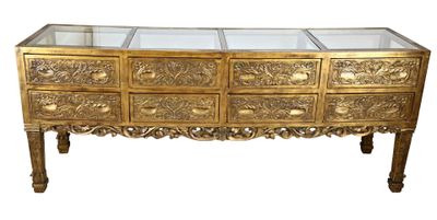 an image of a gold chest of drawers with glass top