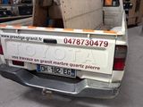 a truck that is parked in a garage