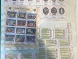 a picture of a picture of some stamps on a sheet of paper
