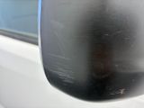 a close up of a car mirror with a reflection on it