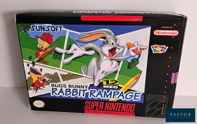 La boîte du jeu « Bugs Bunny Rabbit Rampage » est posée sur la table.
