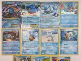 beaucoup de cartes Pokémon accrochées au mur