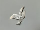 a close up of a metal object with a bird on it