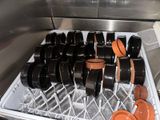many pots and pans that are in the dishwasher