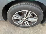 a close up of a tire on a car ' s rim