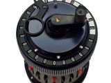 a close up of a black and white dial on a timer