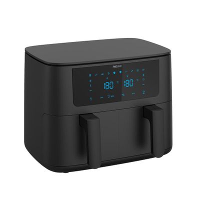 an air fryer with a digital clock on top of it