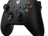 a close up of a controller on a white background
