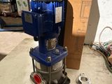 a blue machine that is sitting on top of a table