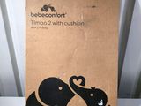 a cardboard box with a picture of a couple of elephants on it