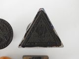 three different types of stamps on a white surface