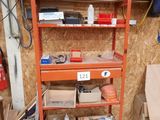 a shelf that has many boxes on it in a garage