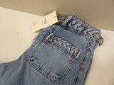 a picture of a pair of jeans with a tag on it