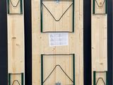 three wooden boxes with a sign attached to them