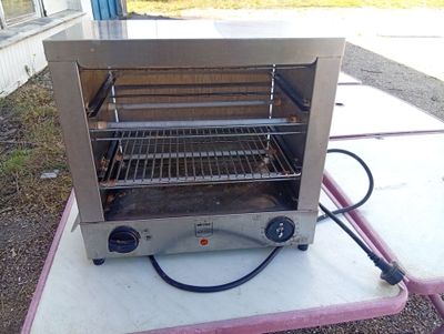 an image of a toaster oven on a picnic table