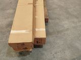 several boxes are stacked on top of each other in a warehouse