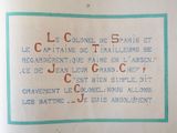 a sign on the side of a building that says, le colonel de paise et capitatan