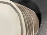 several plates stacked on top of each other on a table