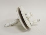 a white object with a spool on top of it