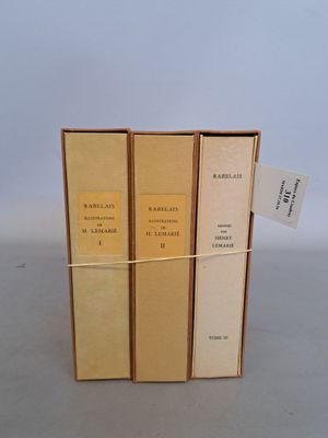 three books that are sitting on a table together