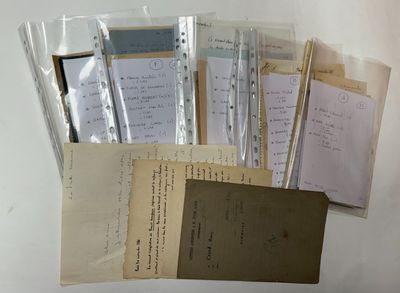 a lot of papers that are on a table