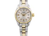 a lady ' s watch with two tone stainless steel and yellow gold