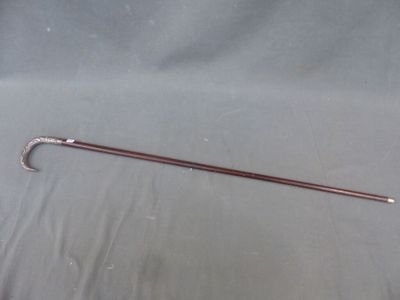 an image of a cane with a handle on a table