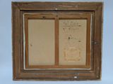 an old picture of a wooden frame with a drawing on it