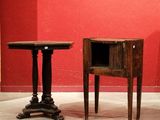 two small tables that are sitting next to each other